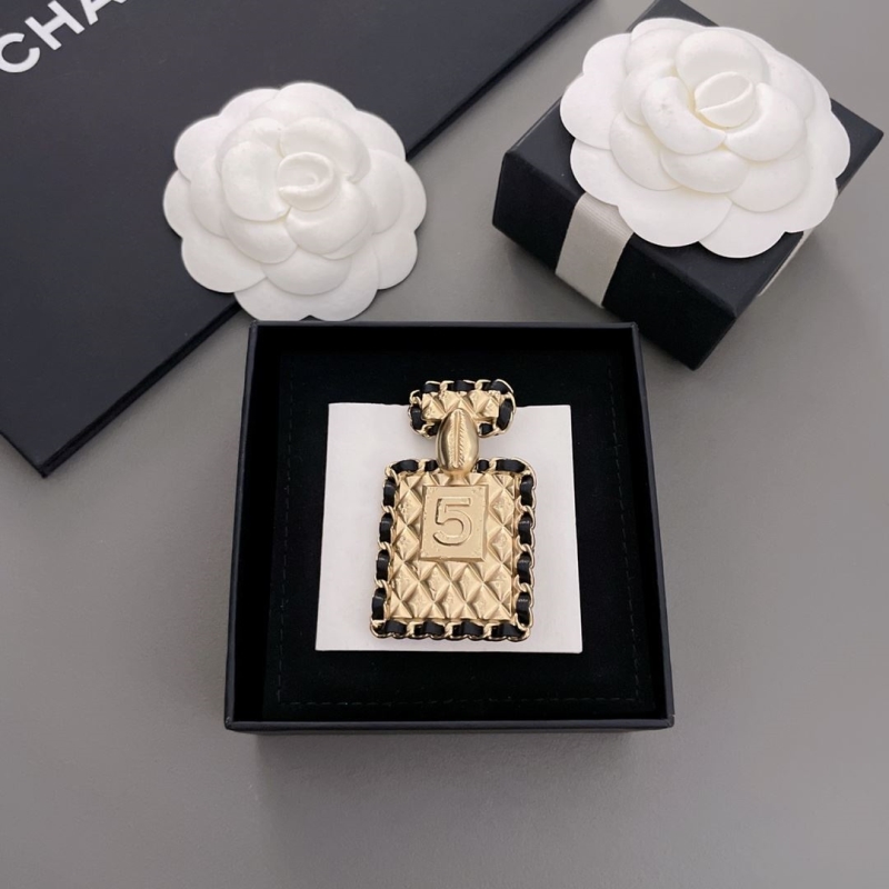 Ch*el brooches